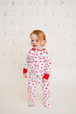 He First Loved Us Footie Pajamas