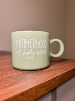 Motherhood is Holy Work Ceramic Mug