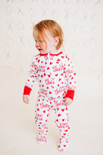 He First Loved Us Footie Pajamas