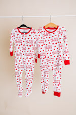 He First Loved Us Footie Pajamas